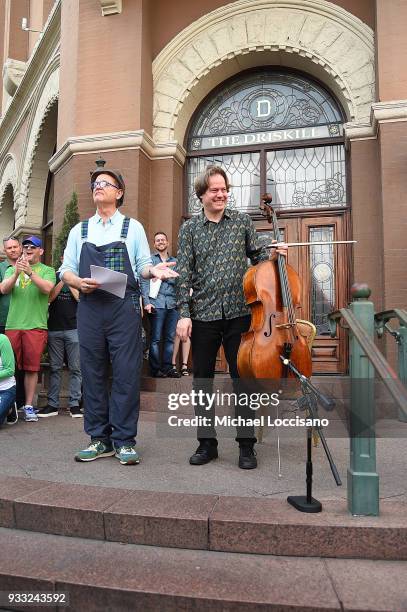 Actor Bill Murray and cellist Jan Vogler partake in a poem reading to a crowd before the "Isle of Dogs" premiere at The Driskill Hotel on March 17,...