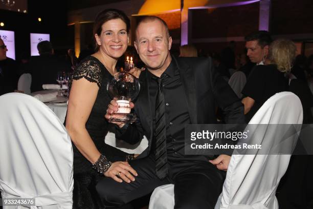 Heino Ferch and his wife Marie-Jeanette Ferch pose with his award during the Steiger Award at Zeche Hansemann on March 17, 2018 in Dortmund, Germany.