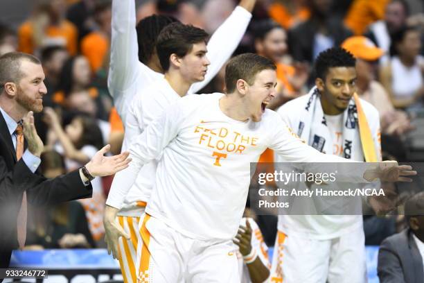 The Tennessee Volunteers bench reacts to a three point play against the Loyola Ramblers during the game in the second round of the 2018 NCAA Photos...