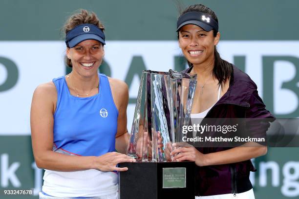 Barbora Strycova of Czech Republic and Su-Wei Hsieh of Taipei pose with the winner's trophy after defeating Ekaterina Makarova and Elena Vesnina of...