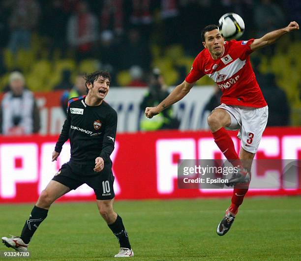 Martin Stranzl of FC Spartak Moscow battles for the ball with Alan Dzagoev of FC CSKA Moscow during the Russian Football League Championship match...