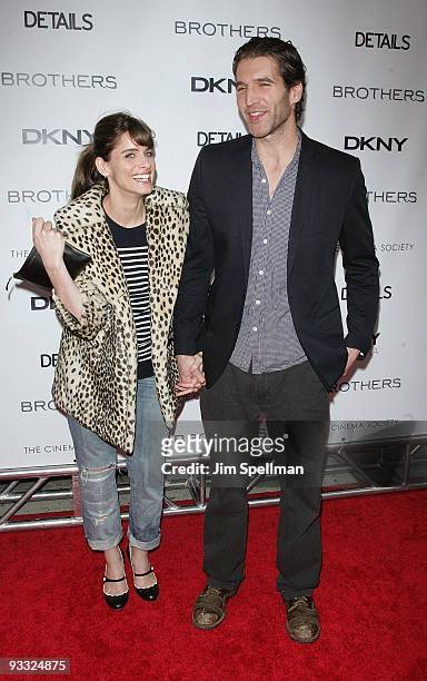 Actress Amanda Peet and Writer David Benioff attend the Cinema Society and DKNY Men screening of "Brothers" at the SVA Theater on November 22, 2009...
