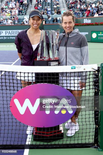 Barbora Strycova of Czech Republic and Su-Wei Hsieh of Taipei pose with the winner's trophy after defeating Ekaterina Makarova and Elena Vesnina of...