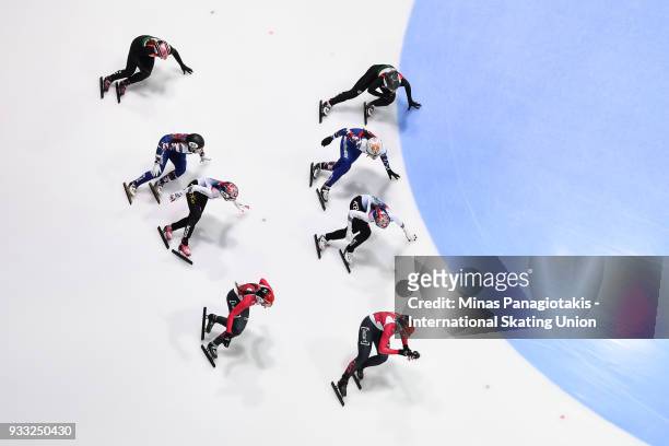 Overhead view of athletes competing in the women's 3000 meter semifinal relay during the World Short Track Speed Skating Championships at Maurice...