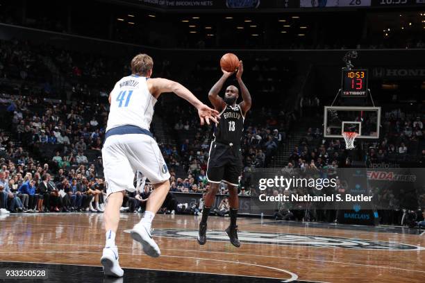 Quincy Acy of the Brooklyn Nets shoots the ball against the Dallas Mavericks on March 17, 2018 at Barclays Center in Brooklyn, New York. NOTE TO...