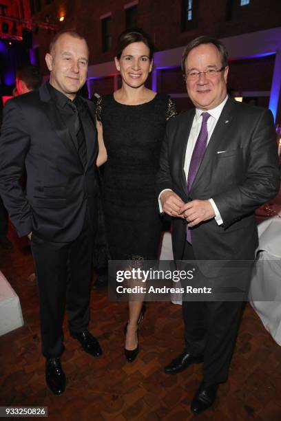 Heino Ferch with his wife Marie-Jeanette Ferch and Armin Laschet attend the Steiger Award at Zeche Hansemann on March 17, 2018 in Dortmund, Germany.