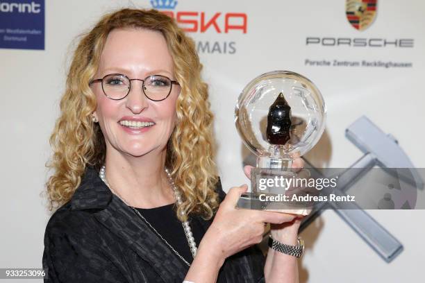 Anne Geddes poses with her award during the Steiger Award at Zeche Hansemann on March 17, 2018 in Dortmund, Germany.
