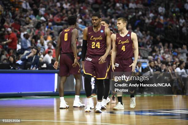 The Loyola Ramblers huddle up during a timeout during the game in the second round of the 2018 NCAA Photos via Getty Images Men's Basketball...