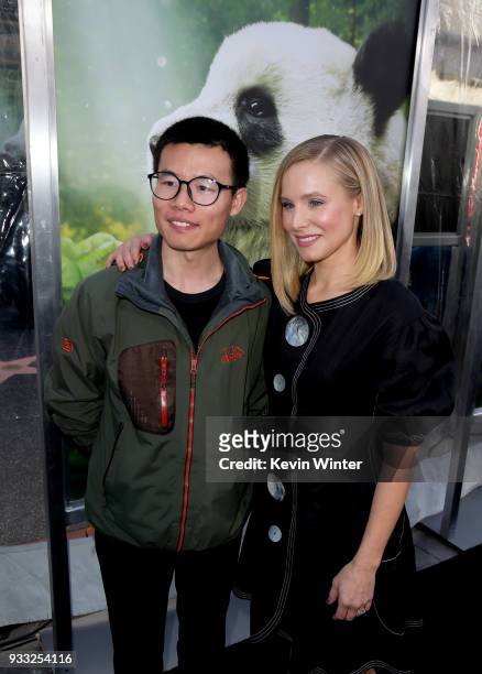 Researcher Bi Wen Lei and actress Kristen Bell arrive at the premiere of Warner Bros. Pictures And IMAX Entertainment's "Pandas" at the Chinese...