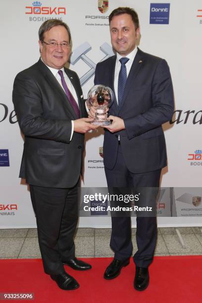 Armin Laschet and Luxembourg Prime Minister Xavier Bettel pose with his award during the Steiger Award at Zeche Hansemann on March 17, 2018 in...