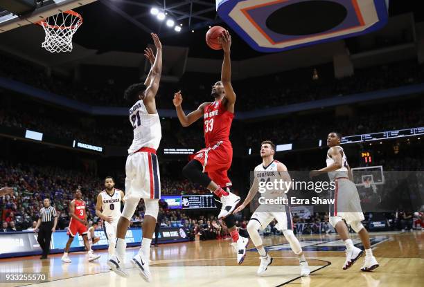 Keita Bates-Diop of the Ohio State Buckeyes drives to the basket against Rui Hachimura of the Gonzaga Bulldogs during the first half in the second...