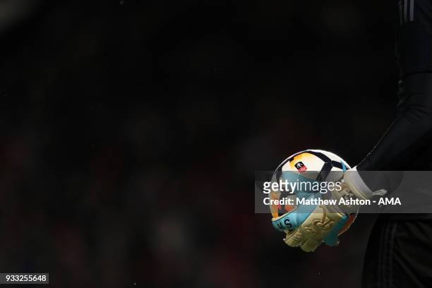 Sergio Romero of Manchester United holds a Nike Ordem FA Cup match ball with his Argentina gloves during the FA Cup Quarter Final match between...