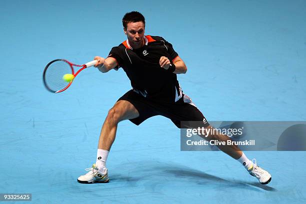 Robin Soderling of Sweden returns the ball during the men's singles first round match against Rafael Nadal of Spain during the Barclays ATP World...