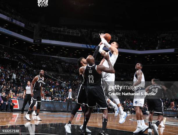 Dwight Powell of the Dallas Mavericks goes to the basket against the Brooklyn Nets on March 17, 2018 at Barclays Center in Brooklyn, New York. NOTE...
