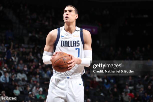 Dwight Powell of the Dallas Mavericks shoots a free throw against the Brooklyn Nets on March 17, 2018 at Barclays Center in Brooklyn, New York. NOTE...