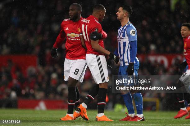 Romelu Lukaku of Manchester United pulls away Anthony Martial as he confronts Beram Kayal of Brighton & Hove Albion during the FA Cup Quarter Final...