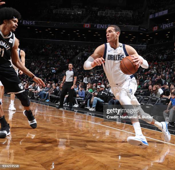 Dwight Powell of the Dallas Mavericks handles the ball against the Brooklyn Nets on March 17, 2018 at Barclays Center in Brooklyn, New York. NOTE TO...
