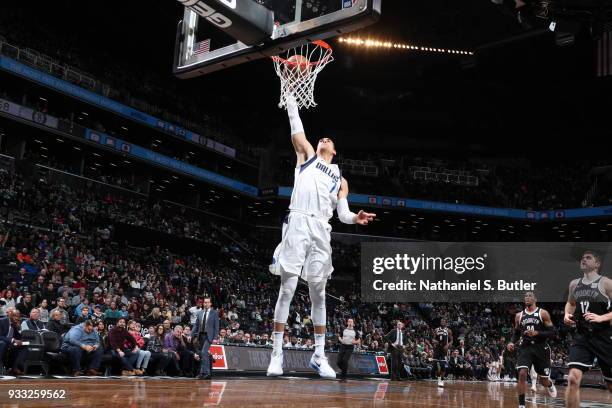 Dwight Powell of the Dallas Mavericks dunks against the Brooklyn Nets on March 17, 2018 at Barclays Center in Brooklyn, New York. NOTE TO USER: User...