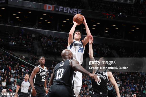 Doug McDermott of the Dallas Mavericks shoots the ball against the Brooklyn Nets on March 17, 2018 at Barclays Center in Brooklyn, New York. NOTE TO...