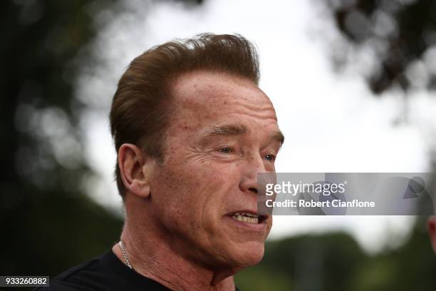 Arnold Schwarzenegger speaks to the media as he prepares to start the Run for the Kids charity run as part of the Arnold Sports Festival Australia at...