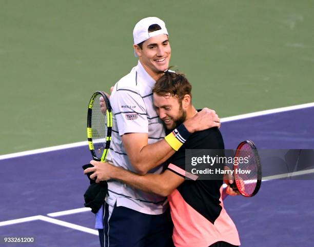 John Isner and Jack Sock of the United States celebrate their ATP doubles final win over Bob Bryan and Mike Bryan of the United States during the BNP...