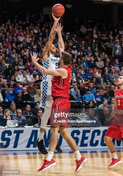 Kevin Knox of the Kentucky Wildcats shoots over F Peyton Aldridge of the Davidson Wildcats during the NCAA Division I Men's Championship First Round...