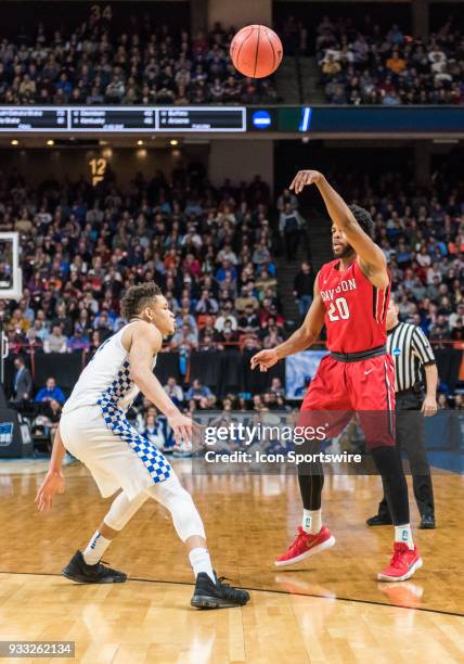 KiShawn Pritchett of the Davidson Wildcats passes over F Kevin Knox of the Kentucky Wildcats in the the NCAA Division I Men's Championship First...