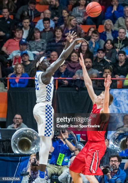 Wenyen Gabriel of the Kentucky Wildcats shoots from the sidelines during the NCAA Division I Men's Championship First Round game between the Kentucky...