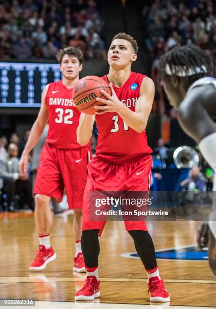 Kellan Grady of the Davidson Wildcats takes two foul shots during the NCAA Division I Men's Championship First Round game between the Kentucky...