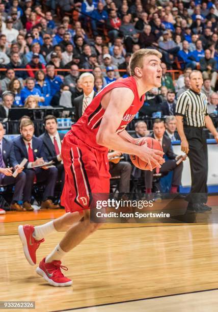 Peyton Aldridge of the Davidson Wildcats moves to the basket during the NCAA Division I Men's Championship First Round game between the Kentucky...