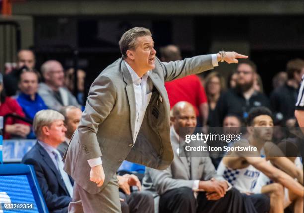 Head Coach John Calipari of the Kentucky Wildcats gestures a play for his team during the NCAA Division I Men's Championship First Round game between...