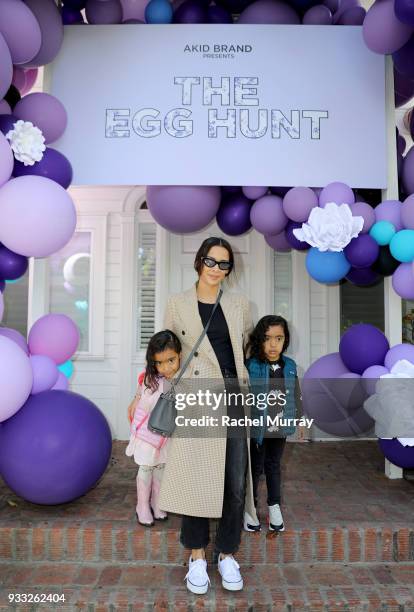 Desiree Raquel Manuel and children attend the AKID Brand's 3rd Annual 'The Egg Hunt' at Lombardi House on March 17, 2018 in Los Angeles, California.