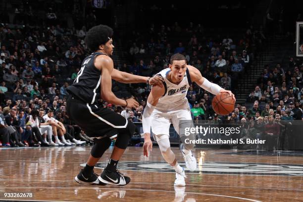 Dwight Powell of the Dallas Mavericks handles the ball against the Brooklyn Nets on March 17, 2018 at Barclays Center in Brooklyn, New York. NOTE TO...