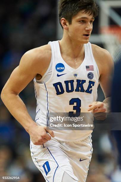 Duke Blue Devils guard Grayson Allen jogs down the court during the second half of the second round of the NCAA Division I Men's Championships...