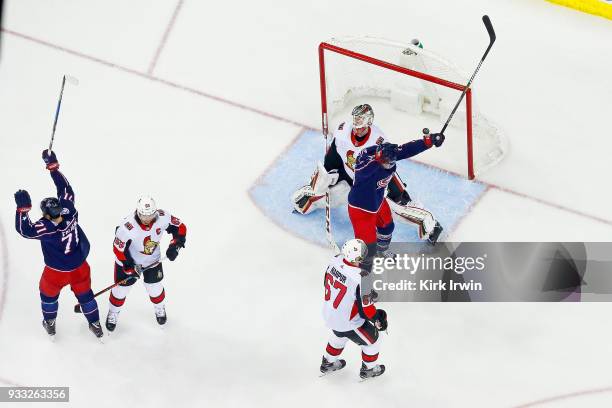 Nick Foligno of the Columbus Blue Jackets and Thomas Vanek of the Columbus Blue Jackets react after Markus Nutivaara of the Columbus Blue Jackets...