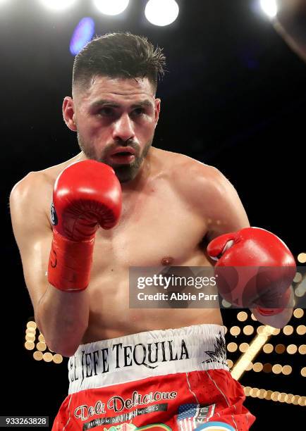 Jose Ramirez fights against Amir Imam during their WBC junior welterweight fight at The Theatre at Madison Square Garden on March 17, 2018 in New...