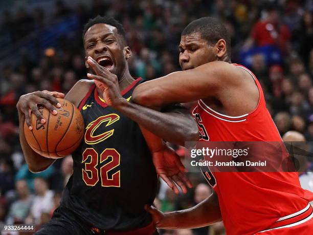 Jeff Green of the Cleveland Cavaliers drives against Cristiano Felicio of the Chicago Bulls at the United Center on March 17, 2018 in Chicago,...