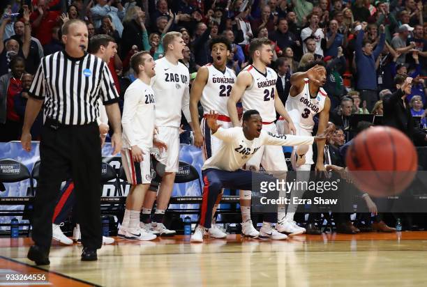 The Gonzaga Bulldogs bench reacts during the second half against the Ohio State Buckeyes in the second round of the 2018 NCAA Men's Basketball...