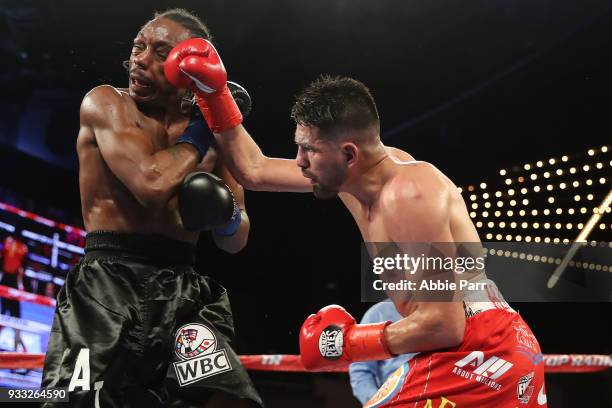 Jose Ramirez punches Amir Imam during their WBC junior welterweight fight at The Theatre at Madison Square Garden on March 17, 2018 in New York City.