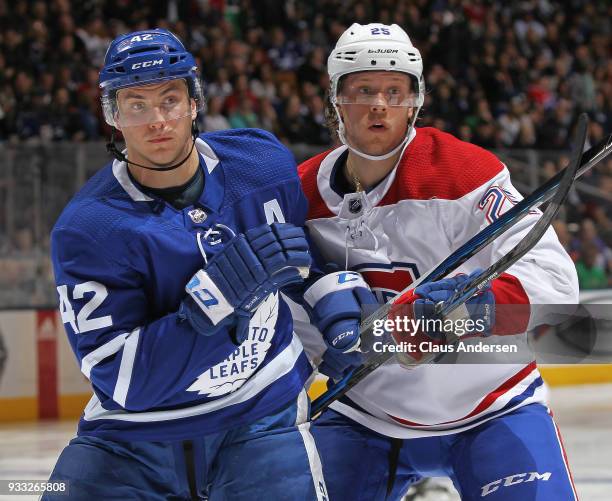 Jacob de la Rose of the Montreal Canadiens skates against Tyler Bozak of the Toronto Maple Leafs during an NHL game at the Air Canada Centre on March...