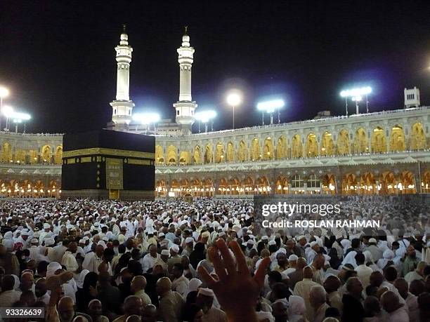Muslim pilgrims perform the circumambulation of the Kaba in the holy city of Mecca, Saudi Arabia 19 December 2007. Around two million Muslims massed...