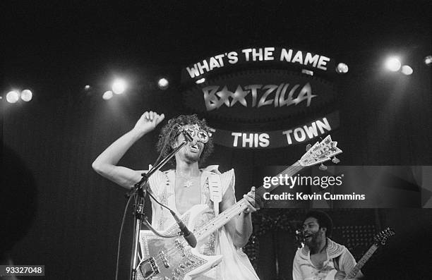 American funk bass player and singer Bootsy Collins with brother Phelps 'Catfish' Collins performs on stage with Bootsy's Rubber Band at the...