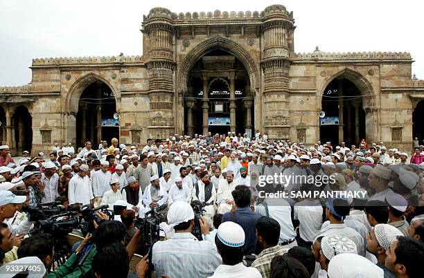 Indian Muslim religious leaders address media representatives following Friday prayers at the Shahi Jama Masjid Mosque in Ahmedabad on August 1,...