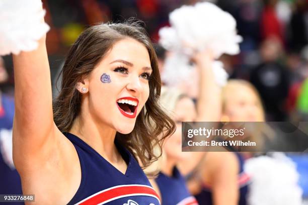 Gonzaga cheerleader cheers on the team as they face the Ohio State Buckeyes in the second round of the 2018 NCAA Photos via Getty Images Men's...