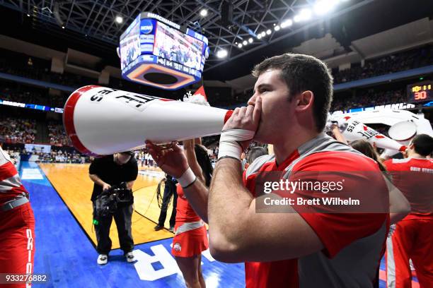 An Ohio State cheerleader leads the crowd in a chant before the second half of the game against the Gonzaga Bulldogs in the second round of the 2018...