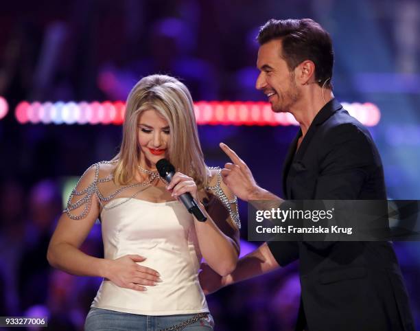 Beatrice Egli and Florian Silbereisen during the TV show 'Heimlich! Die grosse Schlager-Ueberraschung' on March 17, 2018 in Munich, Germany.