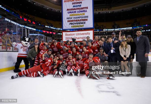 The Boston University Terriers celebrate after the Terriers won the Hockey East Championship 2-0 against the Providence College Friars during NCAA...