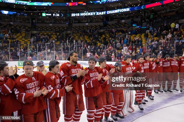 The Boston University Terriers celebrate after the Terriers won the Hockey East Championship 2-0 against the Providence College Friars during NCAA...