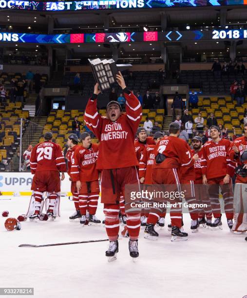 Dante Fabbro of the Boston University Terriers celebrates after the Terriers won the Hockey East Championship 2-0 against the Providence College...