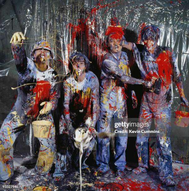 Manchester rock group The Stone Roses in a paint-spattered abstract expressionist romp on November 05, 1989. Left to right are drummer Alan 'Reni'...